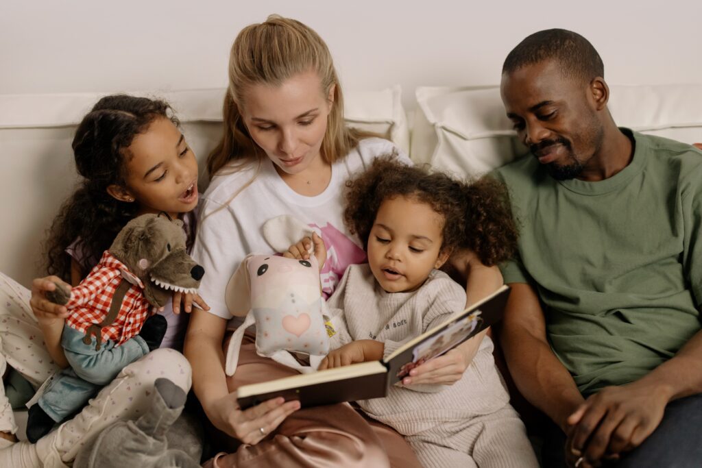 family reading in bed