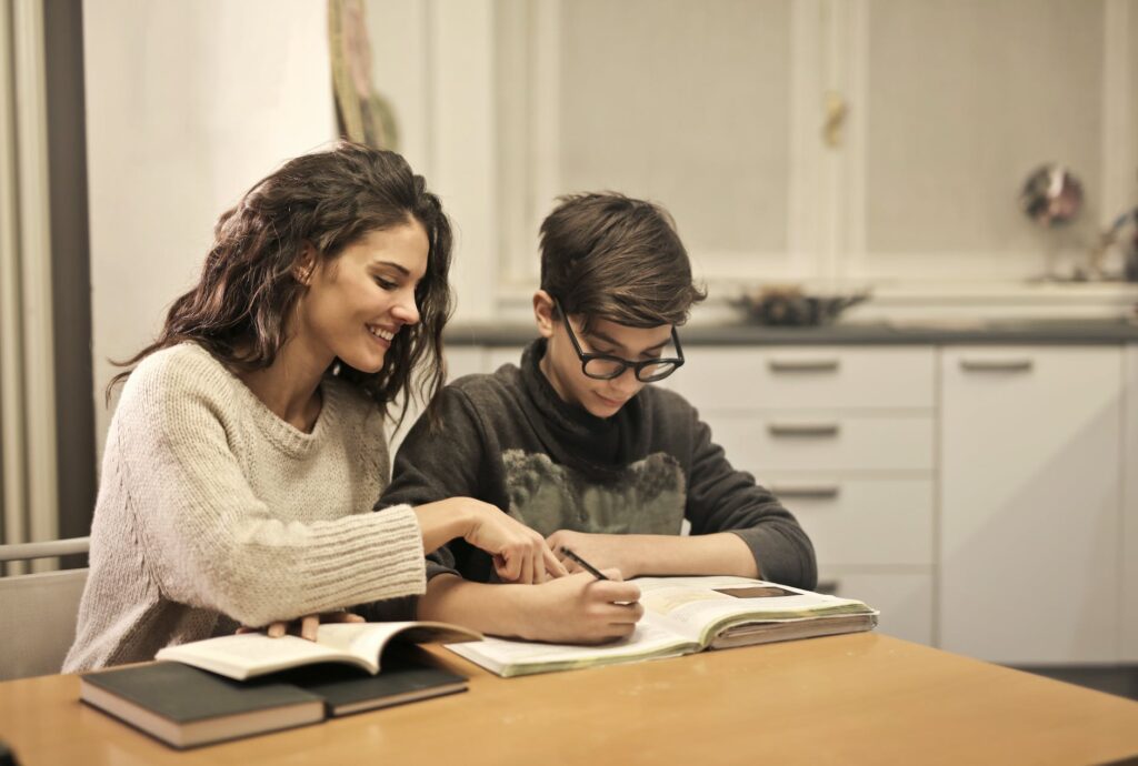 mom helping son balancing multiple grade levels
