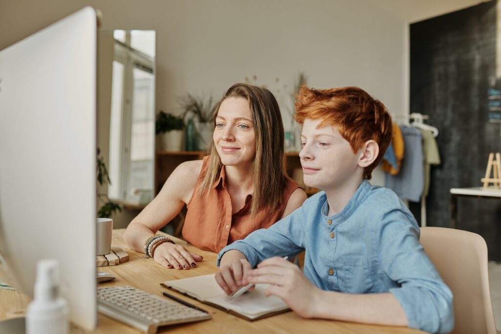 mom and son working