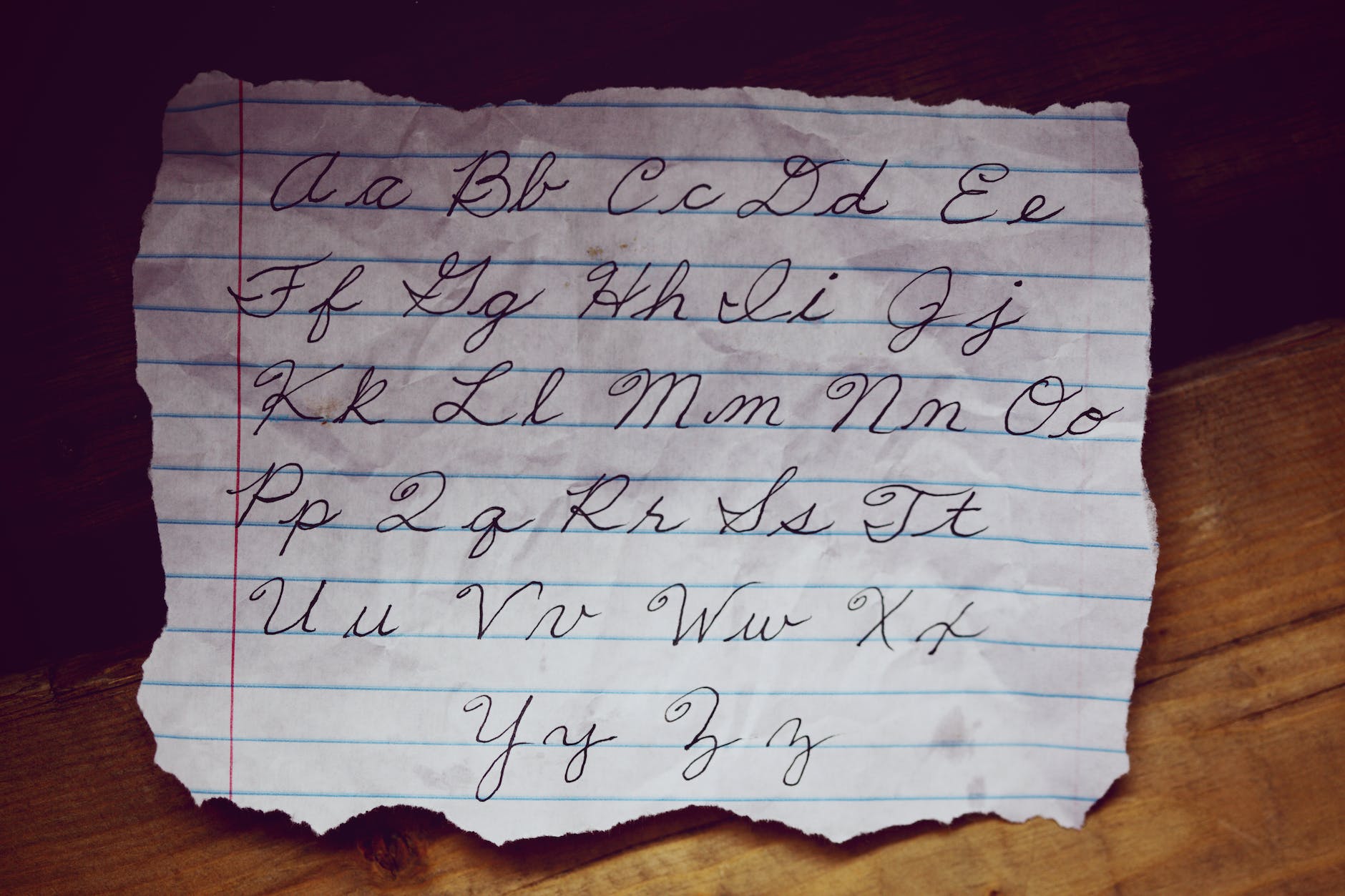 photo of cursive letters on a paper